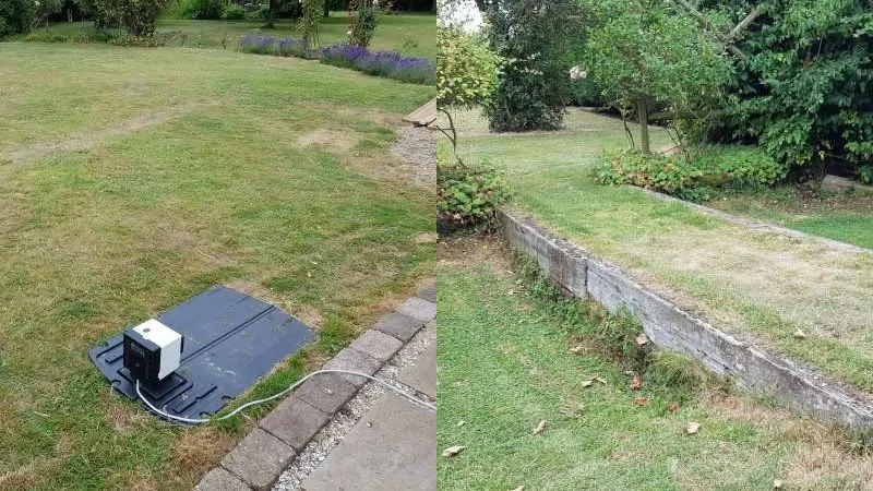 Two separate lawn areas with boundary wire setup system placed on the grass.